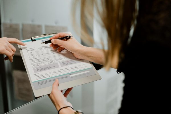 woman-filling-out-form